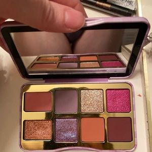 Too Faced mini eyeshadow palette. Just swatched the colors. Never used